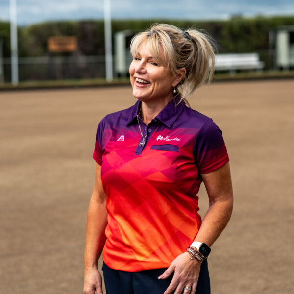 Henselite_Spectrum_Women's_Polo_Purple_Orange_1